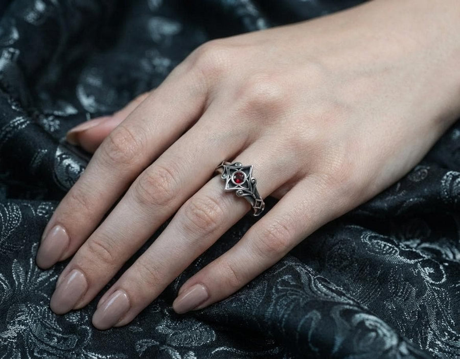 Sterling Silver Gothic Ring, Handcrafted Gemstone Band with Medieval Elegance, Unique Wedding Ring or Gift, Gothic Heritage Elegant Gift, The image highlights the contrast between the gemstone and the metal. The red stone has a deep, bloody saturation that catches the light. The 925 sterling silver has a vintage, oxidized finish, giving it the appearance of an ancient artifact rather than a brand-new factory piece. The metalwork looks delicate bu (etsy image id: 7102074108)