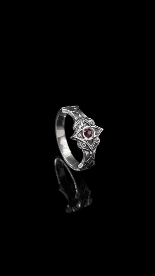 Sterling Silver Gothic Ring, Handcrafted Gemstone Band with Medieval Elegance, Unique Wedding Ring or Gift, Gothic Heritage Elegant Gift, The image highlights the contrast between the gemstone and the metal. The red stone has a deep, bloody saturation that catches the light. The 925 sterling silver has a vintage, oxidized finish, giving it the appearance of an ancient artifact rather than a brand-new factory piece. The metalwork looks delicate bu (etsy image id: 7102074108)
