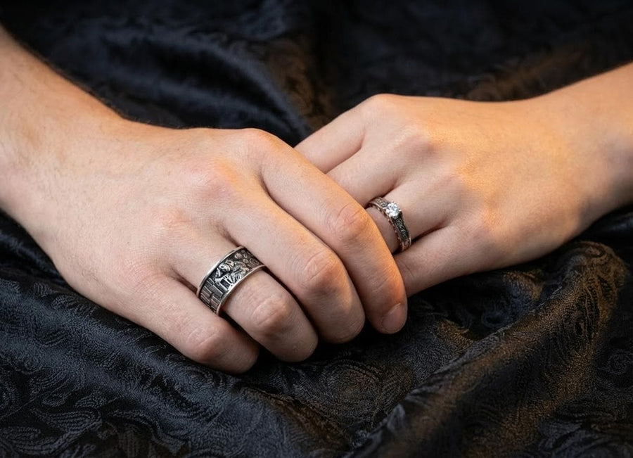 A detailed macro shot of a sterling silver engagement ring. The focal point is a round, honey-colored gemstone (Citrine or Madeira Topaz) set flush into the band. The shank is decorated with a continuous relief pattern of spirals and circles, mimicking the decorative robes found in Gustav Klimt's "Golden Phase" paintings. The silver features an oxidized finish, creating a dark background that makes the polished spirals pop. (etsy image id: 7142785932)