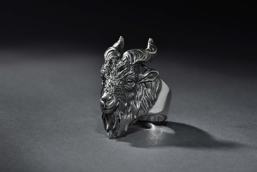 Embrace the mystique and strength of the goat with this handcrafted sterling silver goat ring. Designed for those who appreciate wild nature, Norse symbolism, and bold statement jewelry, this ring captures the essence of independence, intelligence, and resilience.

The intricately detailed goat head design makes this ring perfect for animal lovers, Viking enthusiasts, and those drawn to occult or pagan aesthetics. __etsy:4047309436