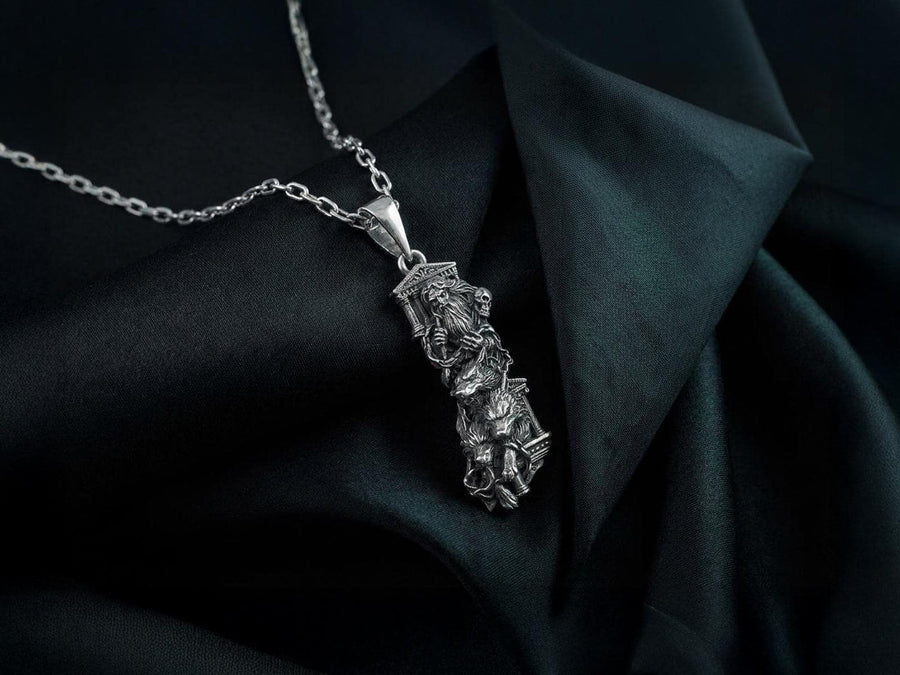 Crafted from premium solid sterling silver, this heavy, sculptural pendant demonstrates the striking visual impact of an oxidized patina. The dark sulfur treatment settles heavily into the microscopic crevices of the temple steps, the eagle's feathers, and Zeus's beard, providing a permanent shadow that makes the polished, raised metal elements shine brilliantly. A polished silver tapered bail connects the piece to a sturdy geometric chai __etsy:8113663105