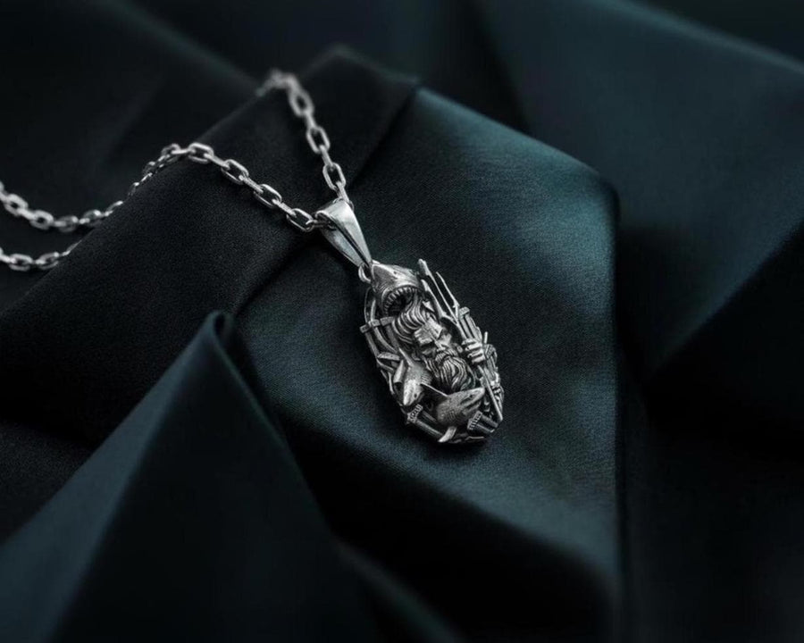 Displayed on a heavy silver chain, this substantial unisex pendant is perfectly scaled to be worn as a striking daily statement piece. Its dark, architectural, and nautical aesthetic appeals strongly to lovers of dark academia, gothic ocean trends, and alternative marine biology fashion. It serves as an impressive gift for collectors of deep-sea or mythological jewelry, pairing exceptionally well with dark maritime textiles, heavy leather jackets __etsy:8067349382