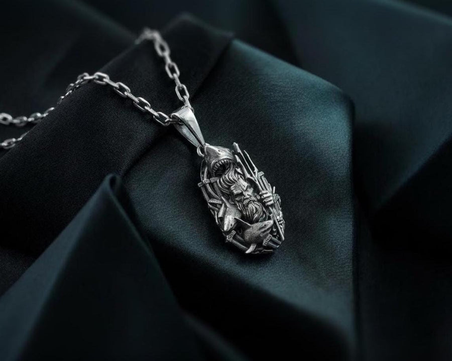 Displayed on a heavy silver chain, this substantial unisex pendant is perfectly scaled to be worn as a striking daily statement piece. Its dark, architectural, and nautical aesthetic appeals strongly to lovers of dark academia, gothic ocean trends, and alternative marine biology fashion. It serves as an impressive gift for collectors of deep-sea or mythological jewelry, pairing exceptionally well with dark maritime textiles, heavy leather jackets __etsy:8067349382