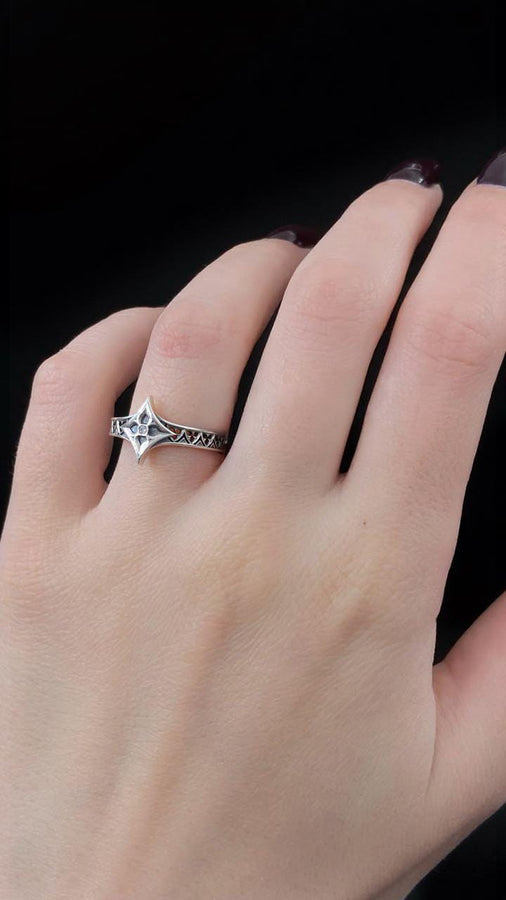 This gothic silver ring stands out with its detailed craftsmanship and gemstone highlight, offering a unique fusion of medieval charm and modern elegance. __etsy:7423453221
