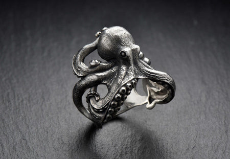 With the octopus silver ring made by our team, you can have the grasp of an aquatic creature around your finger. __etsy:7260417016