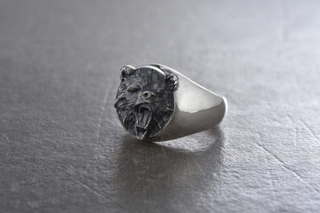 The bear is an animal that symbolizes strength, courage and courage. In folk mythology, the bear is a symbol of life, death and rebirth. Silver is a symbol of magic and protection, which will help you overcome any obstacles.
