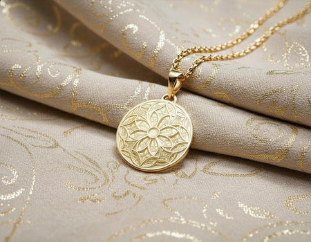 The Tracery Medallion is reimagined in 14k Yellow Gold. The transformation gives it the appearance of a Byzantine gold coin or a sacred seal. The warm metal makes the geometric pattern feel radiant and solar, contrasting with the cool lunar feel of the silver version. This piece exudes luxury and ancient wisdom, perfect for a milestone gift. __etsy:7446472598