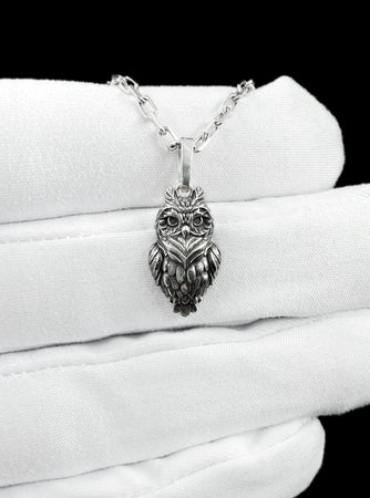 This sterling silver owl pendant necklace captures the quiet power of nature, blending detailed craftsmanship with symbolic meaning. The finely sculpted owl design represents wisdom, intuition, and protection - making it more than jewelry, but a piece you feel connected to every time you wear it. __etsy:7878312842