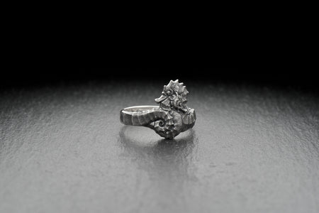 The perfect accessory for any ocean lover, this ring will add a touch of elegance to any outfit. Whether you're dressing up for a special occasion or just want to add some charm to your everyday look, this ring is a must-have.