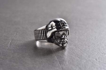Crafted with precision and attention to detail, this ring features a bold soldier design on the front. The intricate details capture the strength and valor of a soldier, making it a striking statement piece.