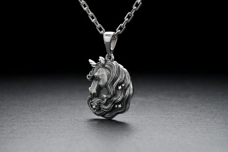 The intricate and delicate design features the iconic unicorn head with a glittering horn, making it a statement piece that will catch the eye of everyone around you.