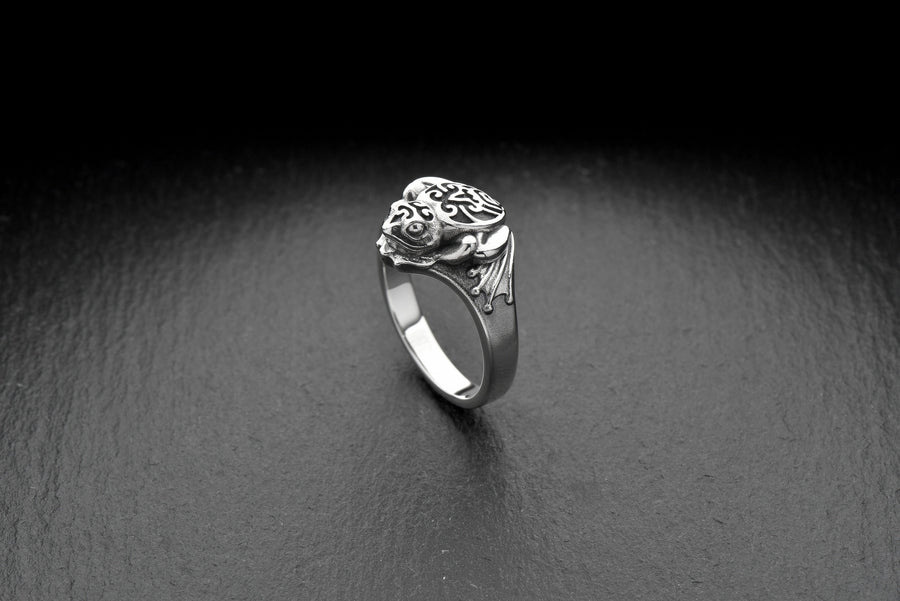 Handcrafted with care, this ring is perfect for anyone who loves to make a statement with their accessories. The intricate details of the frog's skin and eyes create a unique and striking look that will catch everyone's eye. (etsy image id: 4195312676)