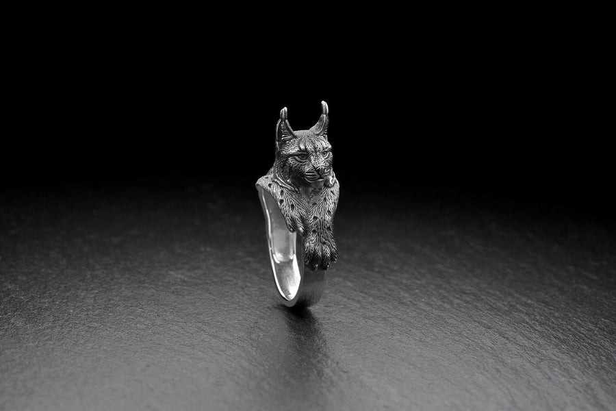 Lynx body silver ring

The lynx is a wild cat. The lynx is the largest wild cat in Canada and parts of the United States. The lynx is a solitary animal, usually only coming together to mate or raise its young. (etsy image id: 4199575474)