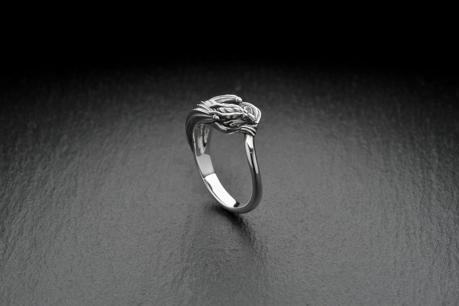 Every dragon lover deserves one of these antique-style silver rings. Inspired by Asian legend, this ring's design is astonishingly detailed. Imagine it sitting inside the palm of your hand. (etsy image id: 7099320726)