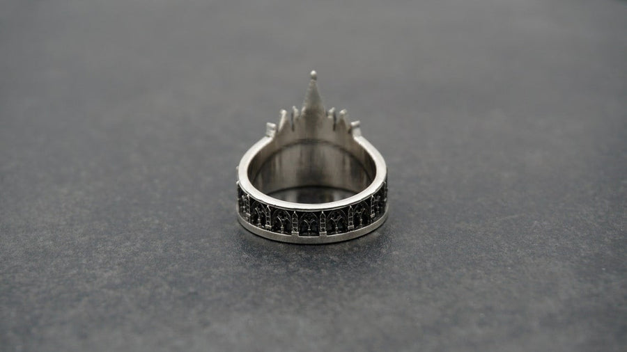 We have rings for people who love to explore the great outdoors, as well as those who love to stay in. With memories and kindness. The image highlights the "chiselled" quality of the 925 sterling silver. The ridges of the rooflines and pillars are sharp and defined, while the background surfaces have a textured, grainy finish like limestone. The oxidation is applied carefully to the "windows" and "doors" of the cathe (etsy image id: 4211827296)