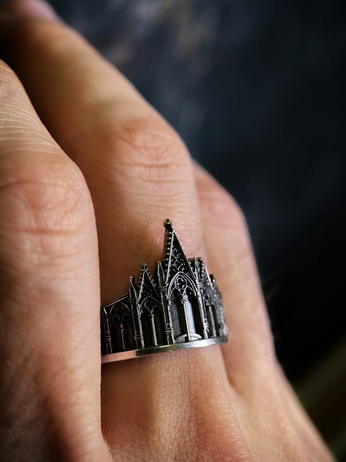 We have rings for people who love to explore the great outdoors, as well as those who love to stay in. With memories and kindness. The image highlights the "chiselled" quality of the 925 sterling silver. The ridges of the rooflines and pillars are sharp and defined, while the background surfaces have a textured, grainy finish like limestone. The oxidation is applied carefully to the "windows" and "doors" of the cathe (etsy image id: 4211827296)