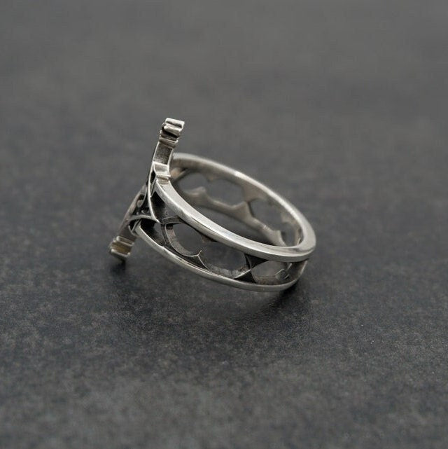 Gothic ring	Medieval jewelry	gothic jewelry	goth ring	Cathedral ring	vintage ring	gothic gift	gothic lover gift	gothic wedding ring	gothic engagement	gothic ring men	gothic black ring	engagement ring, This angle demonstrates the openwork construction of the band. The shoulders feature cut-out arches that reduce the weight of the ring and add an airy, cathedral-like quality. The symmetry of the North/South points is precise. (etsy image id: 7225054934)