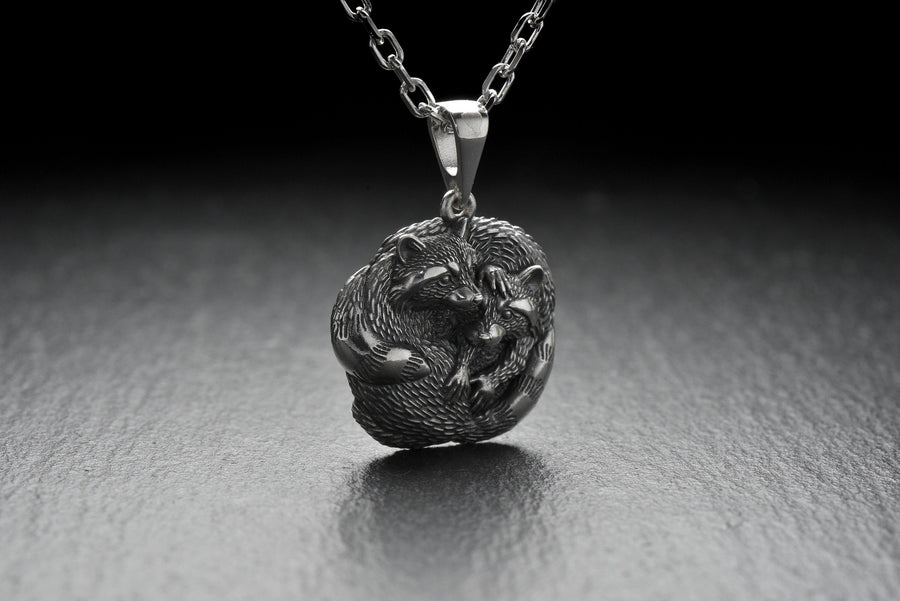 The pendant is made of high quality silver, which guarantees its durability and resistance to damage. Its unique adorable raccoon design is eye-catching and adds a pop of color to any look. (etsy image id: 6100406265)