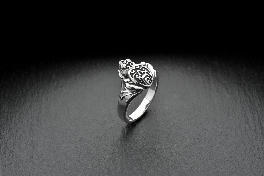 Handcrafted with care, this ring is perfect for anyone who loves to make a statement with their accessories. The intricate details of the frog's skin and eyes create a unique and striking look that will catch everyone's eye. (etsy image id: 4195312676)