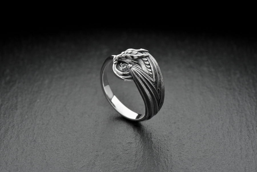 Every dragon lover deserves one of these antique-style silver rings. Inspired by Asian legend, this ring's design is astonishingly detailed. Imagine it sitting inside the palm of your hand. (etsy image id: 7099320726)