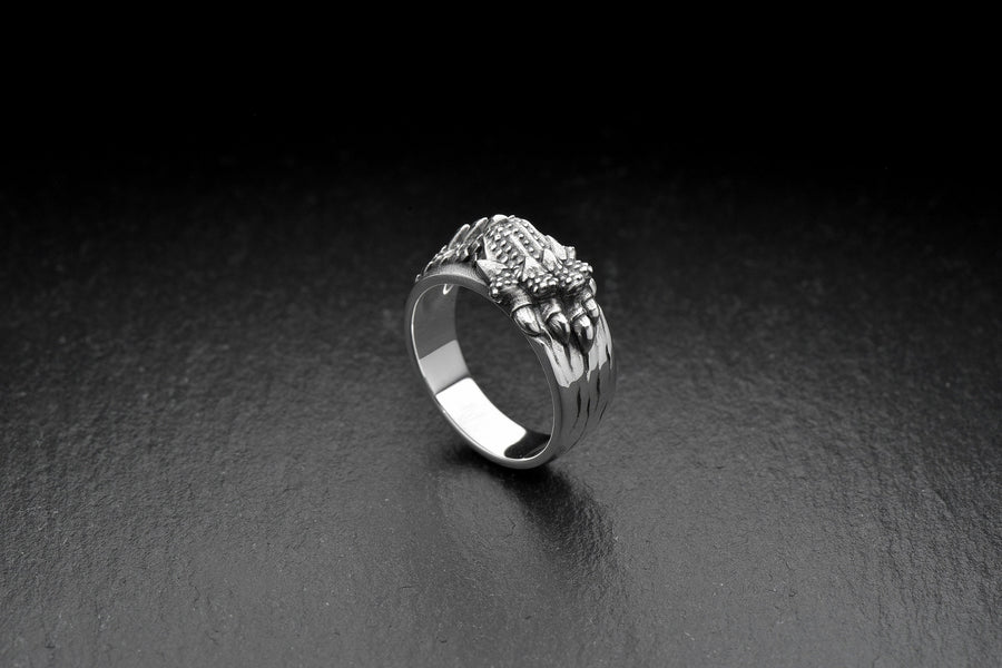 Made with high-quality sterling silver, this ring is both stylish and durable. Whether you're dressing up for a night out or adding a touch of edge to your everyday look, this ring is the perfect accessory. (etsy image id: 7099610710)