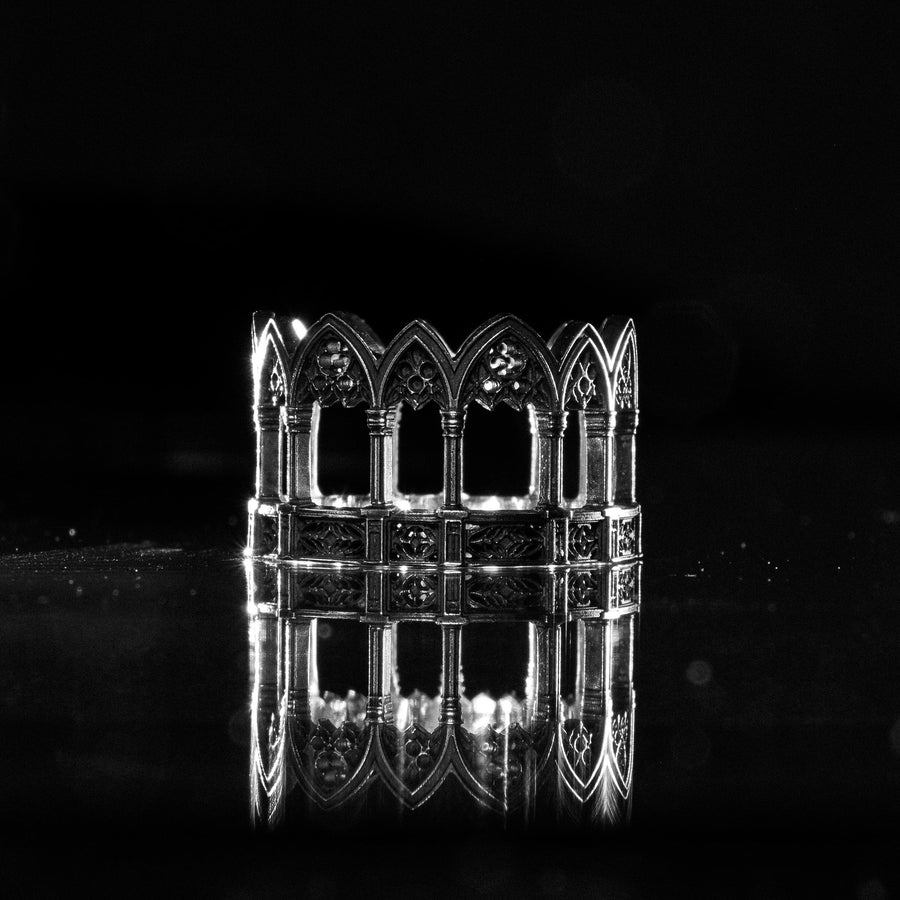 Sterling Silver Gothic Ring, Vintage Ring, Engagement Ring, Handmade Medieval Jewelry, Mens Ring, Unique Womens Gift, Gift Idea, Unique Ring, This angle demonstrates the "openwork" illusion of the design. While the ring is a solid band, the deep relief casting creates the appearance of a hollow gallery or walkway. The repetition of the arches is mathematically precise, mirroring the rhythm of a Gothic nave. It showcases a mastery of arc (etsy image id: 7305776203)