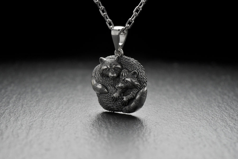 The pendant is made of high quality silver, which guarantees its durability and resistance to damage. Its unique adorable raccoon design is eye-catching and adds a pop of color to any look. (etsy image id: 6100406265)