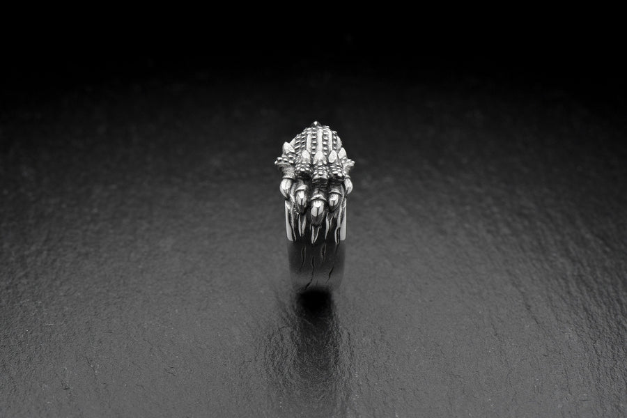 Made with high-quality sterling silver, this ring is both stylish and durable. Whether you're dressing up for a night out or adding a touch of edge to your everyday look, this ring is the perfect accessory. (etsy image id: 7099610710)