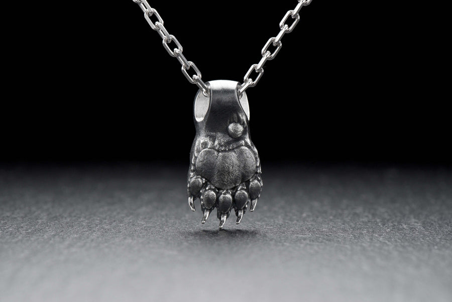 Bear Paw Silver Pendant

Imagine being able to carry a wild animal with you wherever you go. Take back the power and get your self totem today. (etsy image id: 4365951375)
