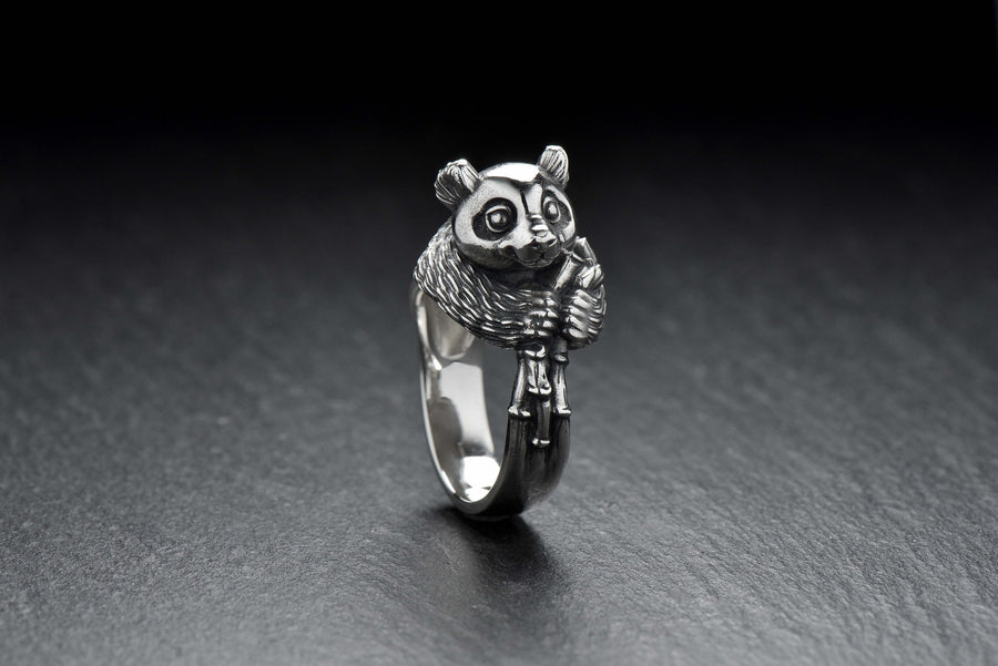 Celebrate the gentle charm of pandas with this beautifully crafted sterling silver panda ring. Designed with intricate detail, this ring captures the playful and endearing spirit of one of nature's most beloved creatures. (etsy image id: 6483013394)