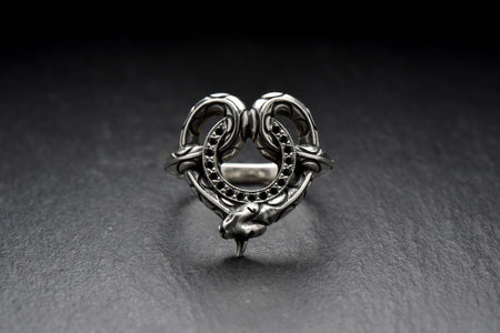 Made with high-quality materials and expert craftsmanship, this ring is both stylish and durable. The combination of the snake and stone design creates a bold and dynamic look that's sure to turn heads. (etsy image id: 4365662422)
