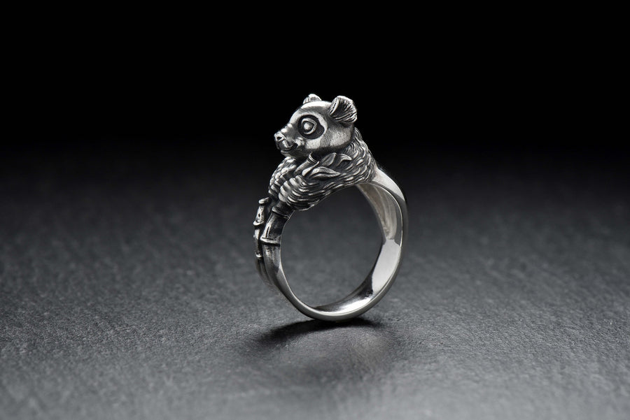 Celebrate the gentle charm of pandas with this beautifully crafted sterling silver panda ring. Designed with intricate detail, this ring captures the playful and endearing spirit of one of nature's most beloved creatures. (etsy image id: 6483013394)