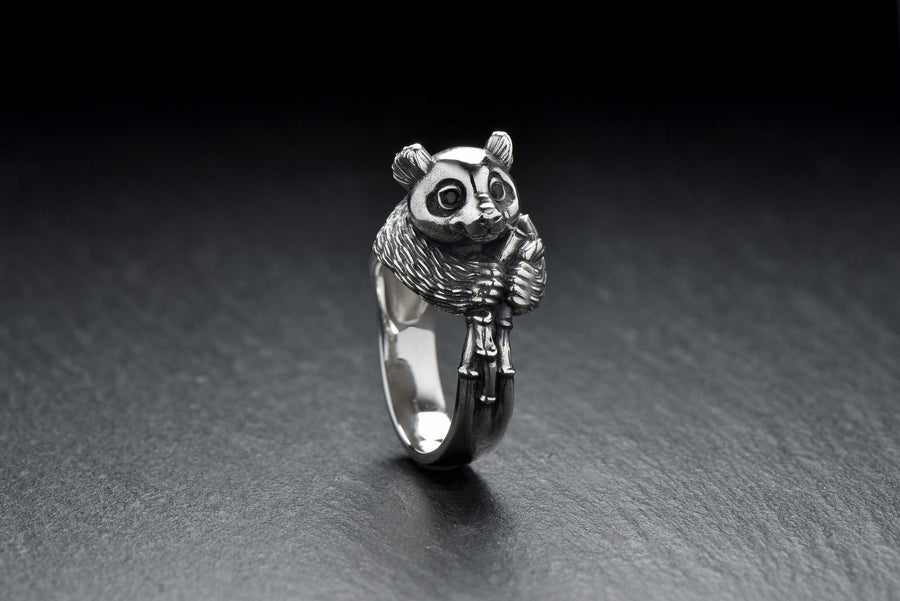 Celebrate the gentle charm of pandas with this beautifully crafted sterling silver panda ring. Designed with intricate detail, this ring captures the playful and endearing spirit of one of nature's most beloved creatures. (etsy image id: 6483013394)