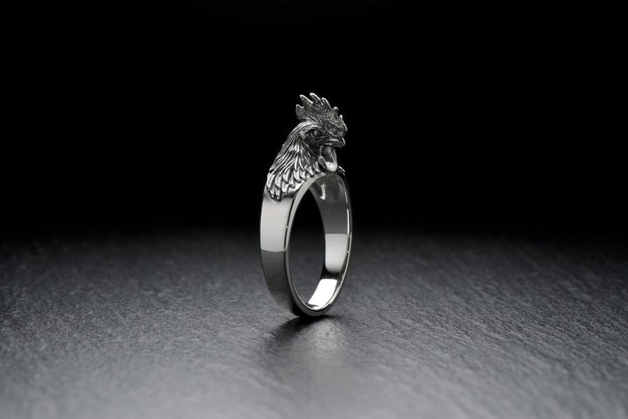Show off your unique style with a Rooster Silver Ring! Handcrafted and made from sterling silver, this ring is the perfect addition to any outfit. (etsy image id: 6995523004)