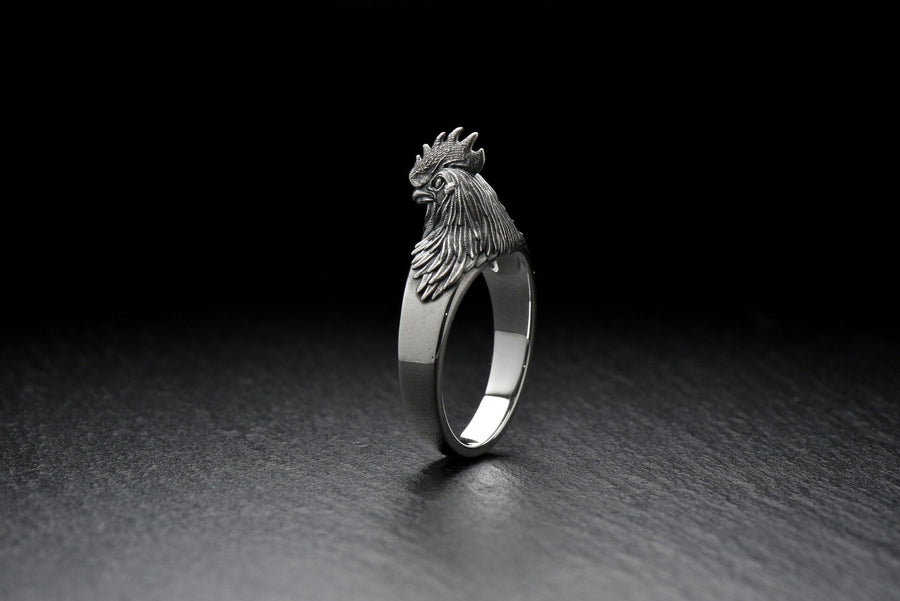 Show off your unique style with a Rooster Silver Ring! Handcrafted and made from sterling silver, this ring is the perfect addition to any outfit. (etsy image id: 6995523004)