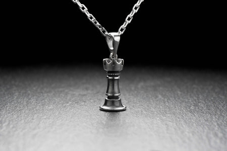 The Rook is one of the most powerful pieces on the chessboard, known for its ability to move horizontally or vertically. Wear this pendant as a symbol of your love for the game, or simply as a stunning accessory that will complement any outfit. (etsy image id: 4652585564)