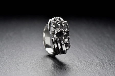 Whether you're dressing up for a night out or adding some edge to your everyday look, this ring is the perfect accessory. Get yours now and channel your inner goth queen. (etsy image id: 4654799098)