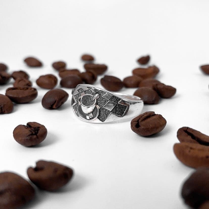 Looking for a unique accessory that celebrates your love for coffee? Check out our stunning silver ring that will make you want to sip your favorite brew all day long! (etsy image id: 4738658083)