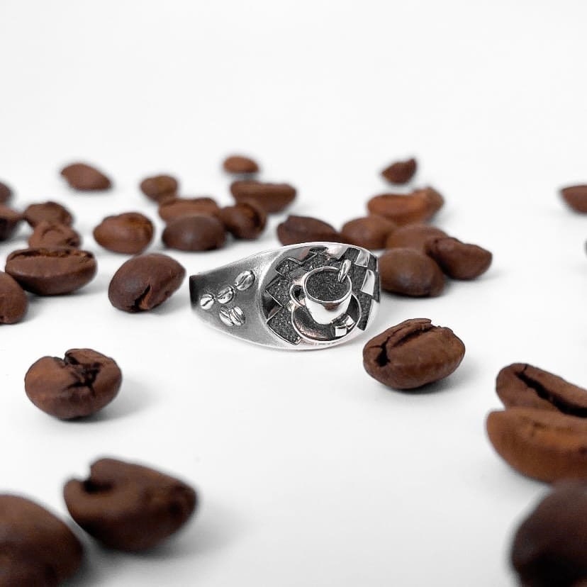 Looking for a unique accessory that celebrates your love for coffee? Check out our stunning silver ring that will make you want to sip your favorite brew all day long! (etsy image id: 4738658083)