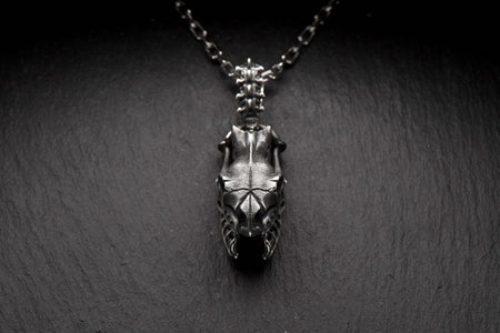 Whether you're dressing up for a night out or adding some edge to your everyday style, this Silver Pendant Snake Skull is the perfect choice. Don't miss out on the opportunity to elevate your look with this striking piece of jewelry. (etsy image id: 4697596239)