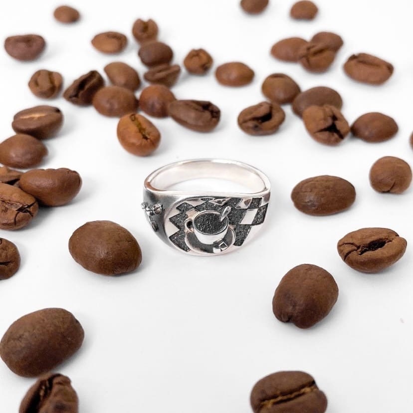 Looking for a unique accessory that celebrates your love for coffee? Check out our stunning silver ring that will make you want to sip your favorite brew all day long! (etsy image id: 4738658083)