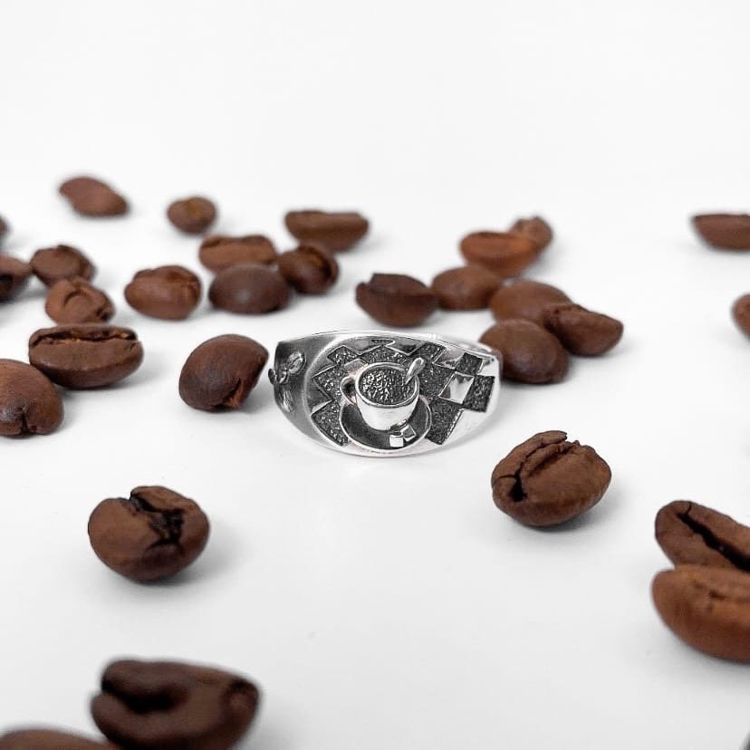 Looking for a unique accessory that celebrates your love for coffee? Check out our stunning silver ring that will make you want to sip your favorite brew all day long! (etsy image id: 4738658083)