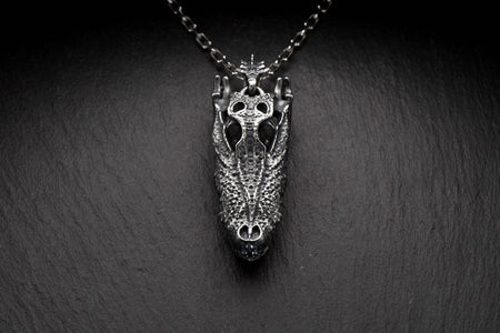 Made for those who appreciate unique and edgy style, this pendant is a bold statement piece that will set you apart from the crowd. Add this crocodile skull pendant to your collection today and let your wild side shine. (etsy image id: 4768250953)