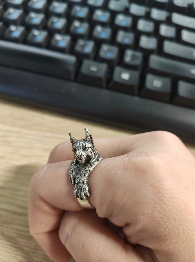 Lynx body silver ring

The lynx is a wild cat. The lynx is the largest wild cat in Canada and parts of the United States. The lynx is a solitary animal, usually only coming together to mate or raise its young. (etsy image id: 4199575474)