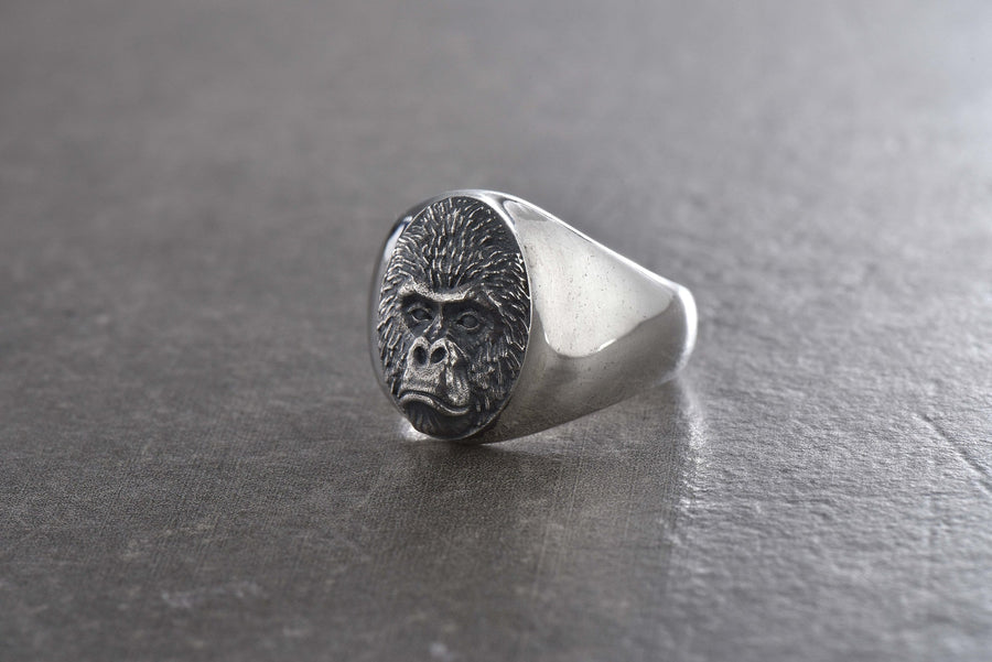 Looking for a unique and stylish ring that will make a statement? Check out our silver gorilla ring! Handcrafted with the utmost attention to detail, this stunning piece features a beautifully detailed gorilla design in solid sterling silver. (etsy image id: 4865275743)
