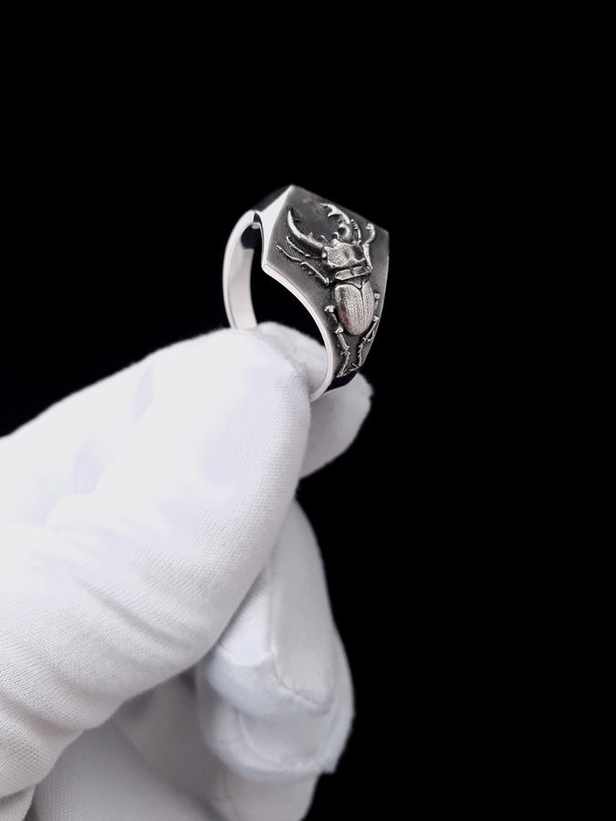 Look no further than this silver stag beetle ring! Handcrafted with care, this ring features a beautifully detailed stag beetle design that is sure to turn heads. (etsy image id: 4673645152)