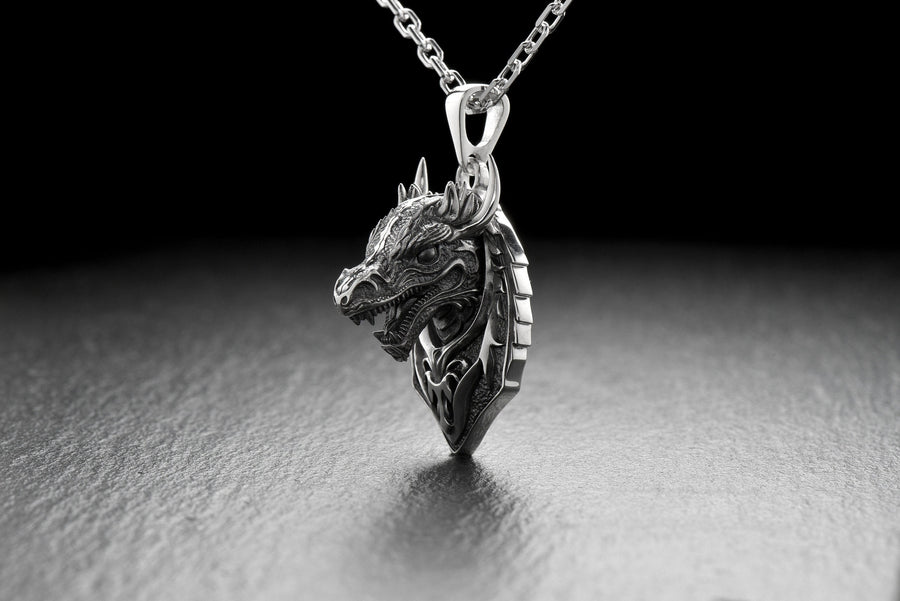 Whether you're looking for a bold statement piece or a subtle addition to your everyday look, this dragon pendant is versatile enough to suit any occasion. (etsy image id: 4804565064)