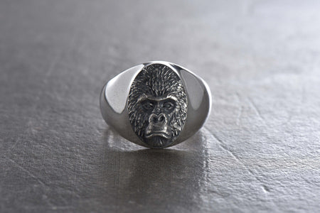 Looking for a unique and stylish ring that will make a statement? Check out our silver gorilla ring! Handcrafted with the utmost attention to detail, this stunning piece features a beautifully detailed gorilla design in solid sterling silver. (etsy image id: 4865275743)