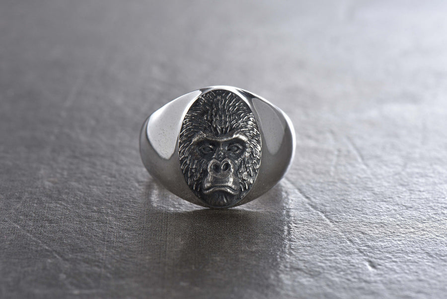 Looking for a unique and stylish ring that will make a statement? Check out our silver gorilla ring! Handcrafted with the utmost attention to detail, this stunning piece features a beautifully detailed gorilla design in solid sterling silver. (etsy image id: 4865275743)