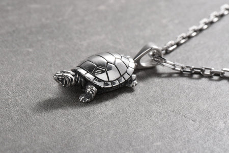 Turtles have long been revered for their wisdom, longevity, and their connection to the natural world. By wearing this pendant, you not only adorn yourself with a stunning piece of jewelry but also embrace the spirit of these fascinating creatures. (etsy image id: 4949299477)